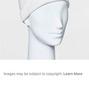 Target off white all in motion beanie with ponytail opening